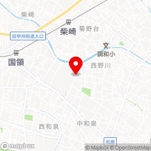 セブン-イレブン 狛江西野川4丁目店の地図